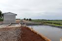 Vizinhos compartilham biodigestor para produzir energia limpa da suinocultura 